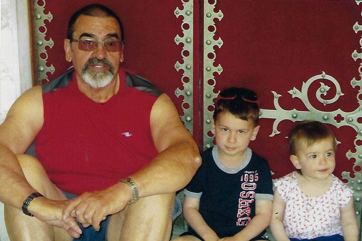 Walter Craveiro sits with his son Nico Craveiro’s children, Luca and Alessia. (Photo provided by Nico Craveiro)