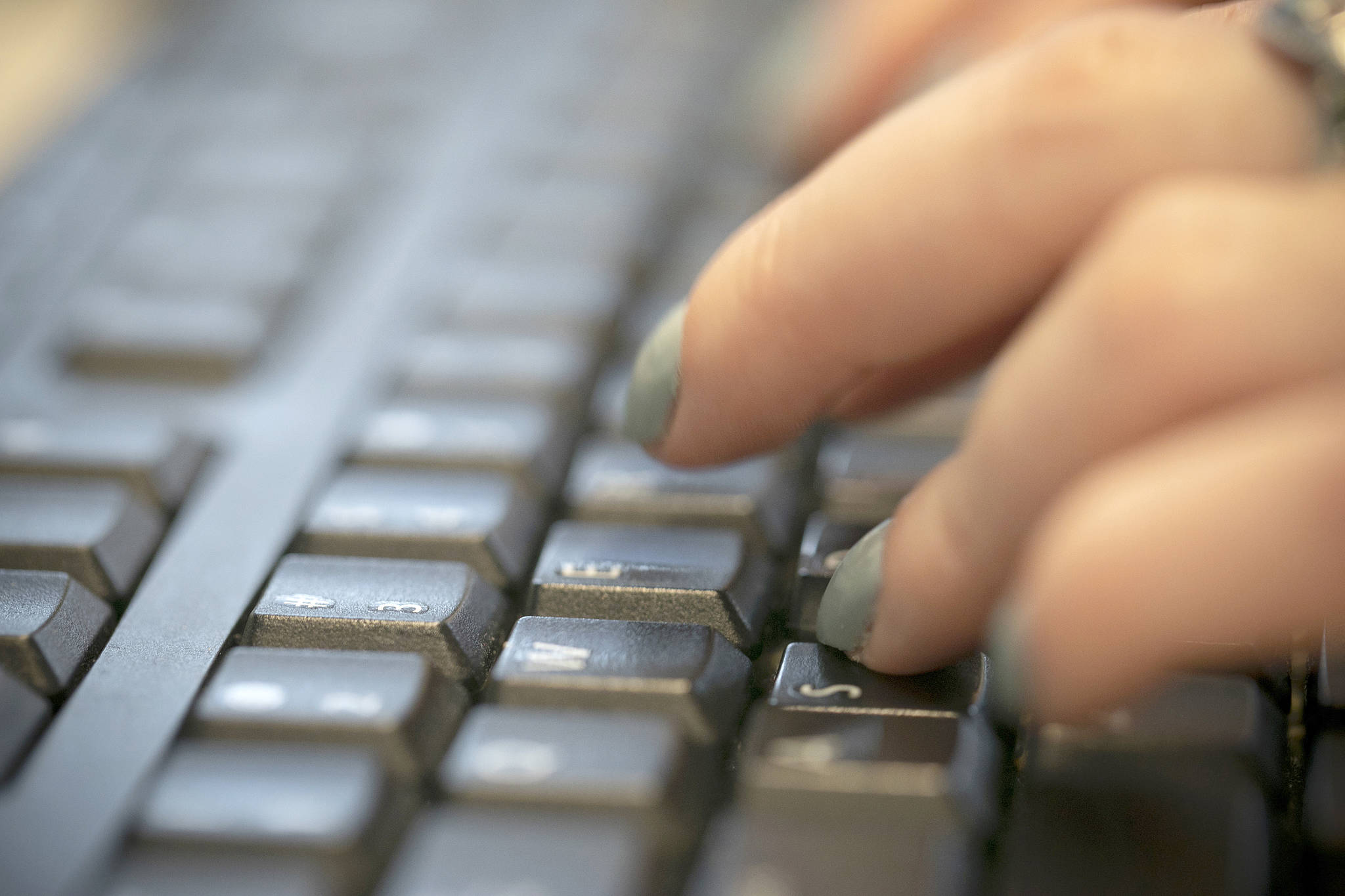 Victoria police are warning people of a continued rise in cybercrime. (AP Photo/Jenny Kane)