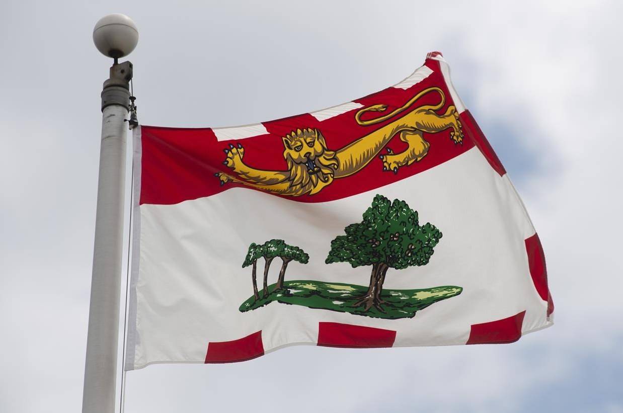 Prince Edward Island’s provincial flag flies on a flag pole in Ottawa, Friday July 3, 2020. A lozenge plant in Prince Edward Island has laid off 30 workers, citing an “almost non-existent” cold and cough season amid COVID-19 restrictions. THE CANADIAN PRESS/Adrian Wyld