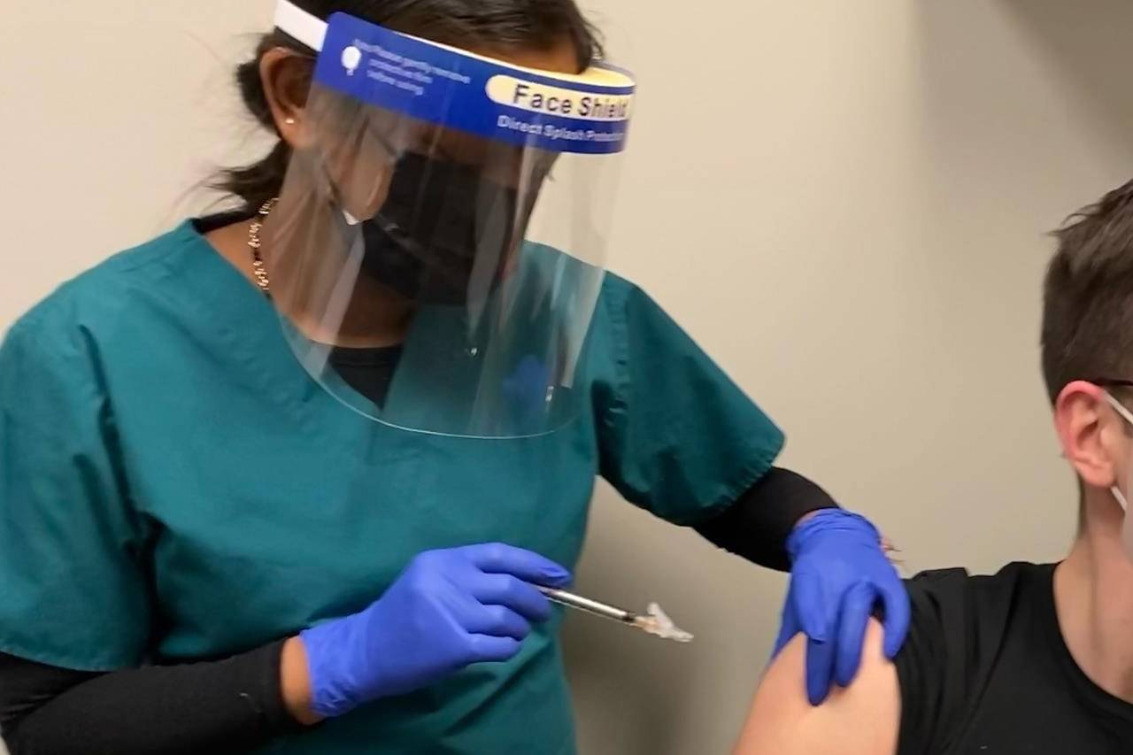 A healthy volunteer receives an injection in this undated handout image provided by Providence Therapeutics. Human clinical trials have begun in Toronto for a proposed COVID-19 vaccine by a Canadian company. Providence Therapeutics of Calgary says 60 subjects will be monitored for 13 months, with the first results expected next month. THE CANADIAN PRESS/HO-Providence Therapeutics *MANDATORY CREDIT*