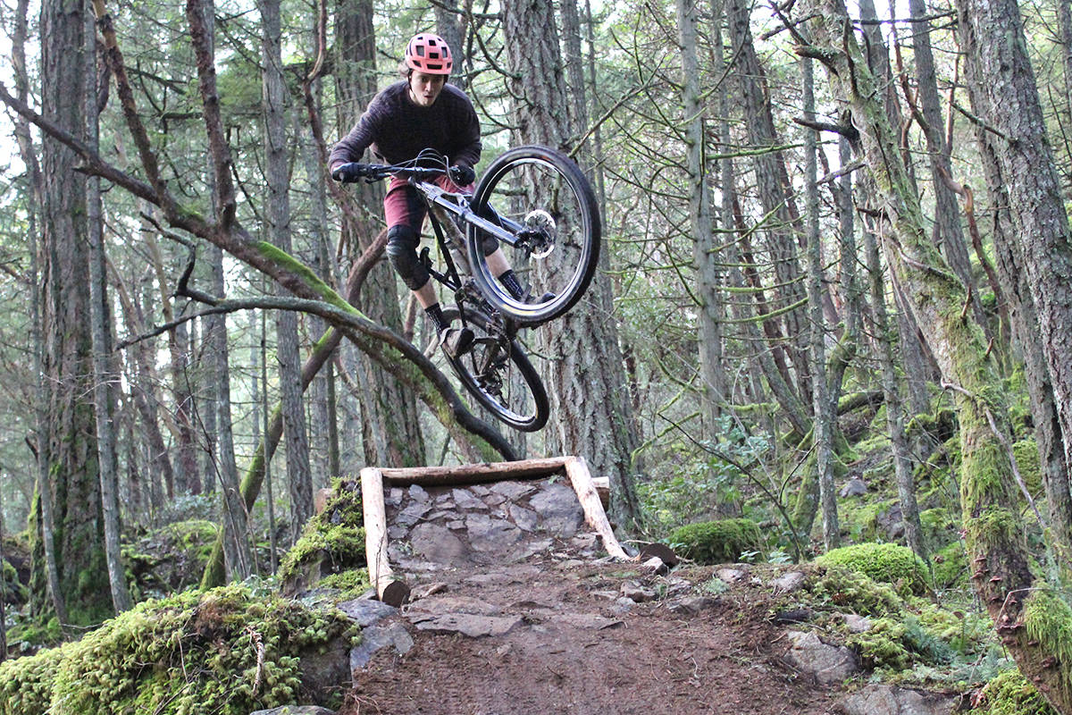 Local cyclist Max McCulloch catches air off a jump in the newly redesigned Organ Donor trail at Mount Work mountain biking park. (Travis Paterson/News Staff)