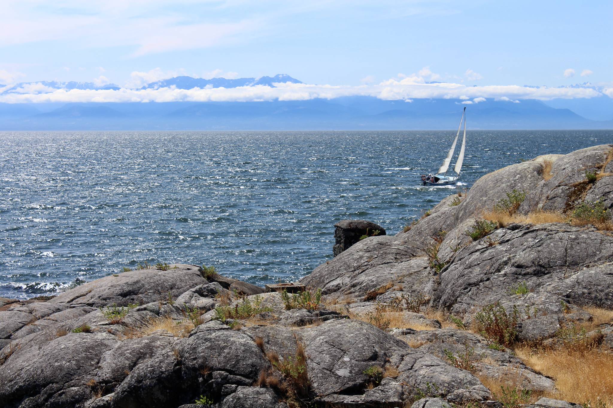A sailboat heads west from Esquimalt in the Strait of Juan de Fuca on the 2020 B.C. Day long weekend. (John McKinley file)