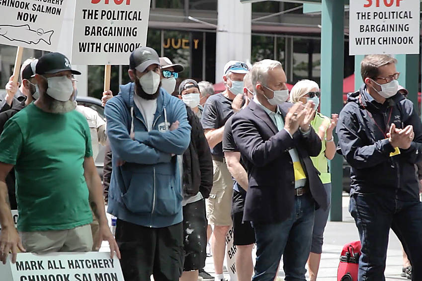 A protest organized by the Public Fishery Alliance outside the downtown Vancouver offices of Fisheries and Oceans Canada July 6 demand the marking of all hatchery chinook to allow for a sustainable public fishery while wild stocks recover. This and other requests were made in a citizen petition responded to in the House of Commons by Fisheries Minister Bernadette Jordan Jan. 25. (Public Fishery Alliance Facebook photo)