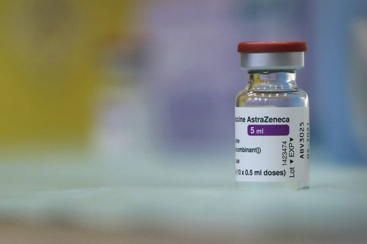 FILE - In this file photo dated Sunday, Feb. 7, 2021, a vial of the Oxford-AstraZeneca vaccine against COVID-19 at a hospital in Sofia, Bulgarian. South Africa on Sunday Feb. 7, 2021, has suspended plans to inoculate its front-line health care workers with the AstraZeneca vaccine after a small clinical trial suggested that it isn’t effective in preventing mild to moderate illness from the variant dominant in the country. (AP Photo/Valentina Petrova, FILE)