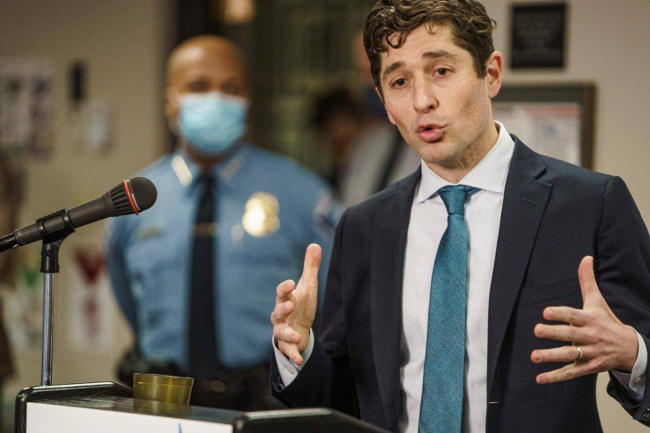 Minneapolis Police Chief Medaria Arradondo looks on as Minneapolis Mayor Jacob Frey addresses the media on the preparations for the upcoming Derek Chauvin trial on Wednesday Feb. 17, 2021 in Minneapolis. (Richard Tsong-Taatarii/Star Tribune via AP, Pool)