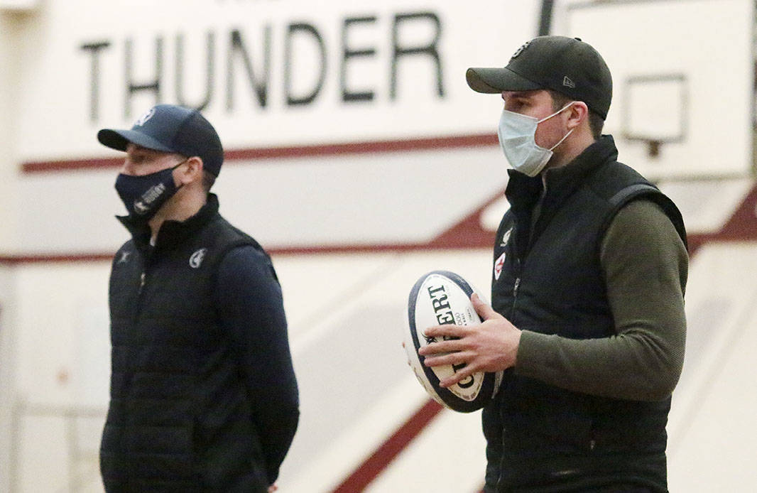 MacDowell Rugby Academy founder Robin MacDowell and national men’s rugby sevens player Pat Kay, both graduates of Cowichan Secondary, speak to students on Wednesday, Feb. 17 about the new academy program that will debut this fall. (Kevin Rothbauer/Citizen)
