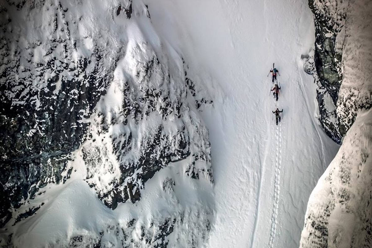 Eric Hjorliefson, Mark Abma and Chris Rubens climb for their powder on Mount Cain. (Matchstick Productions image)
