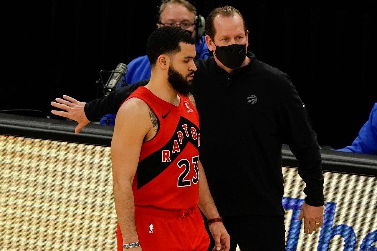 Toronto Raptors head coach Nick Nurse talks to Fred VanVleet during the first half of an NBA basketball game against the Milwaukee Bucks Thursday, Feb. 18, 2021, in Milwaukee. A greatly reduced Raptors team will host the Detroit Pistons on Wednesday in Toronto’s temporary home of Tampa, Fla. THE CANADIAN PRESS/AP, Morry Gash