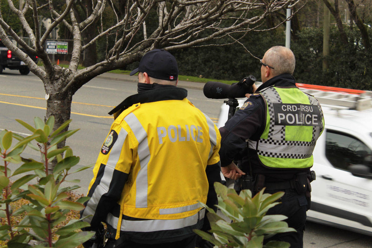 Saanich police traffic safety officers and members of the CRD Integrated Road Safety Unit joined forces to cracking down on distracted driving at the McKenzie/Quadra intersection in Saanich on March 3. (Devon Bidal/News Staff)