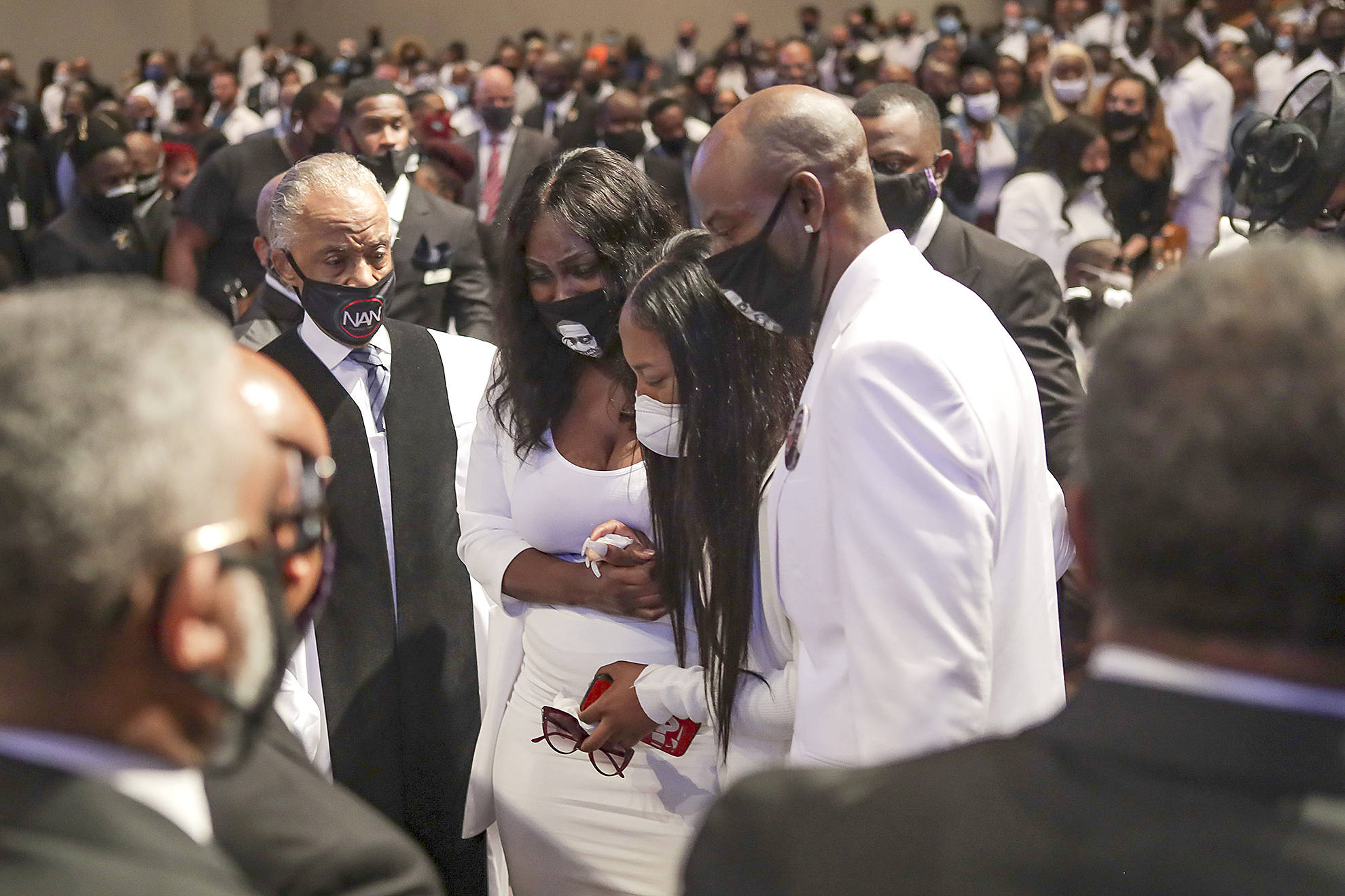 Family members react as they view the casket of George Floyd during the private funeral held Tuesday in Houston, Texas. (Godofredo A. Vasquez/Getty Images)