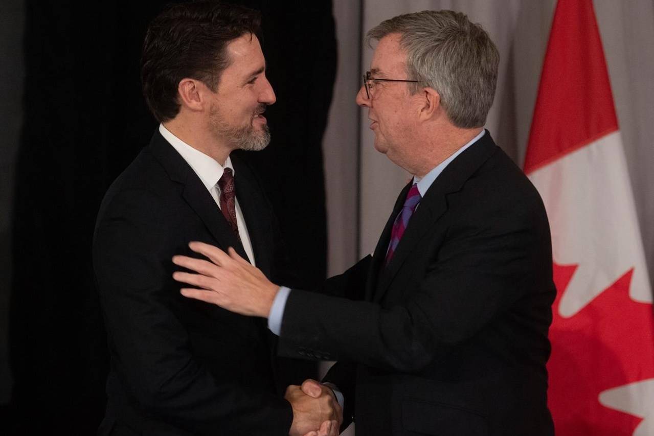 Canadian Prime Minister Justin Trudeau speaks with Ottawa Mayor Jim Watson at the start of a meeting with Mayors of Canada’s largest cities in Ottawa on February 6, 2020. THE CANADIAN PRESS/Adrian Wyld