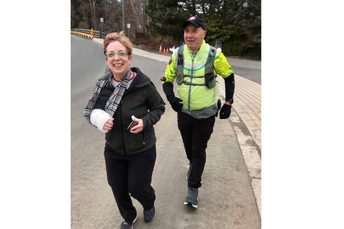 Wendy Sutton got back on her feet and resumed running after a vicious dog attack. She is pictured running with Art Beck as they complete the virtual Comox Valley RV Half Marathon. Photo supplied