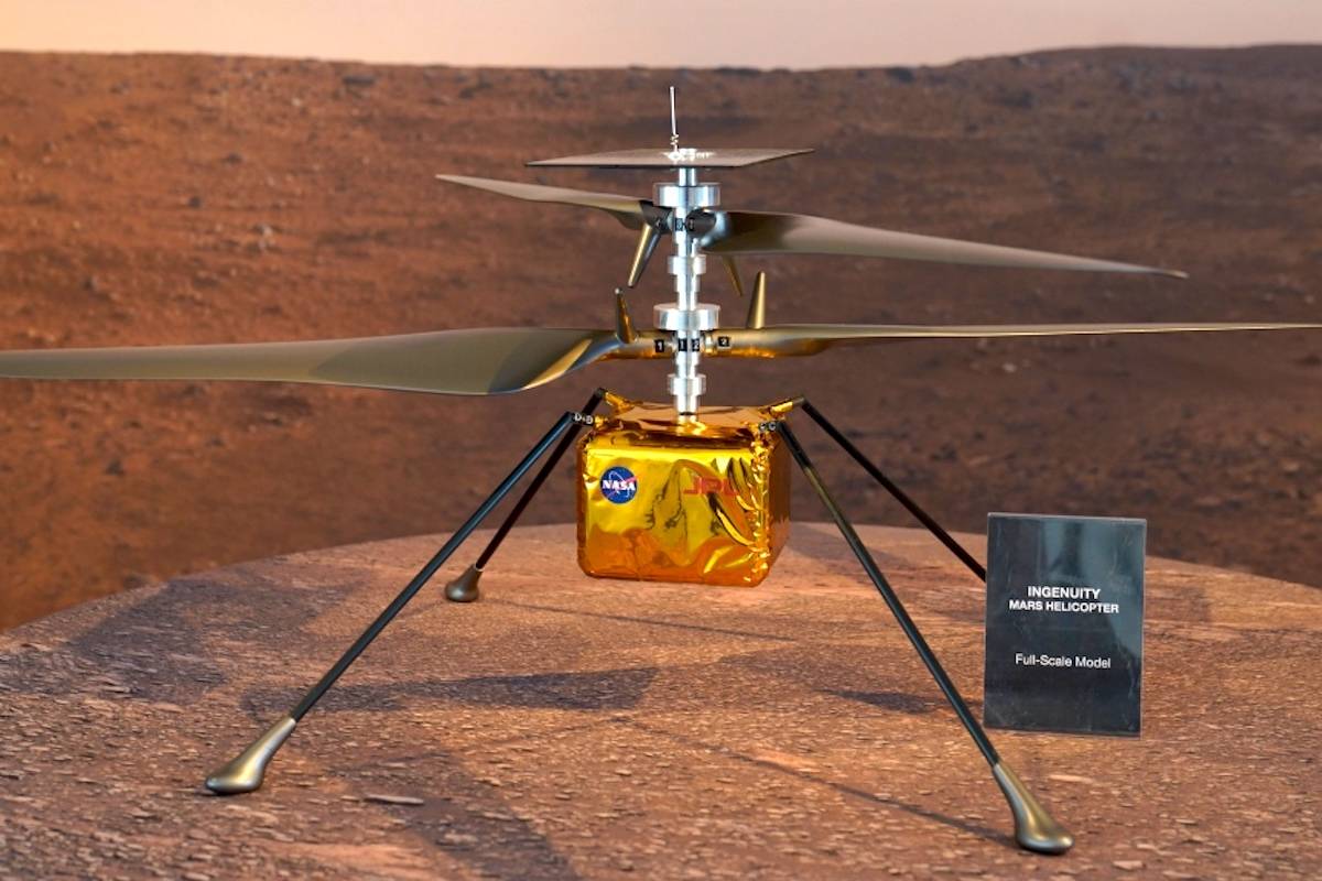 Full-scale model of the Ingenuity helicopter displayed for the media at NASA’s Jet Propulsion Laboratory in Pasadena, Calif. (AP Photo/Damian Dovarganes)