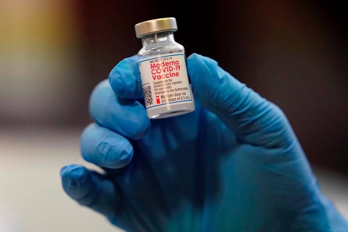 FILE – A vial of the Moderna COVID-19 vaccine is displayed at a pop-up vaccine clinic for EMS workers Center in Salt Lake City on January 5, 2021. THE CANADIAN PRESS/AP, Rick Bowmer