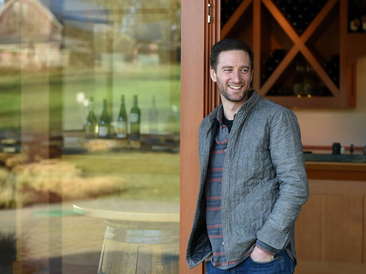 Chris Turyk, Marketing Director, stands outside the tasting room at Unsworth Vineyards. Don Denton photo
