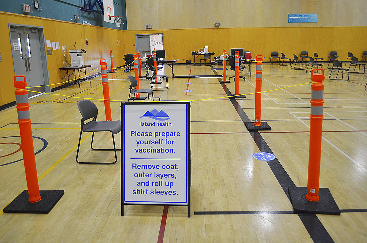 The inside of the Campbell River Community Centre gymnasium has been marked off in order to facilitate the public flowing through the clinic as they receive their COVID-19 vaccination. Photo by Alistair Taylor – Campbell river Mirror