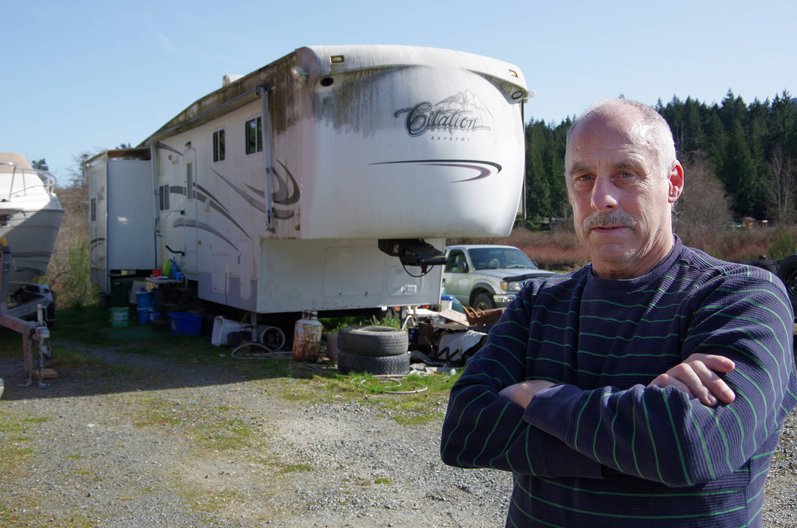 Pat Kauwell, a semi-retired construction manager, lives in his fifth-wheel trailer on Maxey Road because that’s what he can afford on his pension, but a Regional District of Nanaimo bylaw prohibits using RVs as permanent dwellings, leaving Kauwell and others like him with few affordable housing options. (Chris Bush/News Bulletin)