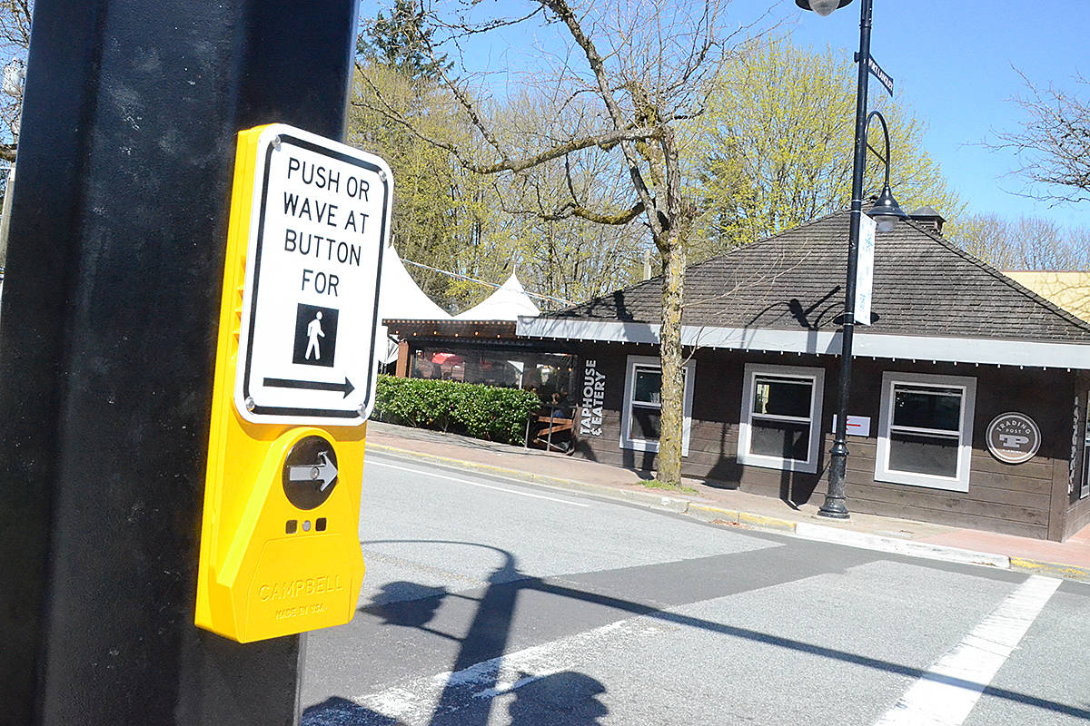 The corner of 96th Avenue and Glover Road in Fort Langley now has traffic signals, and new “touchless” signal activation buttons. (Matthew Claxton/Langley Advance Times)