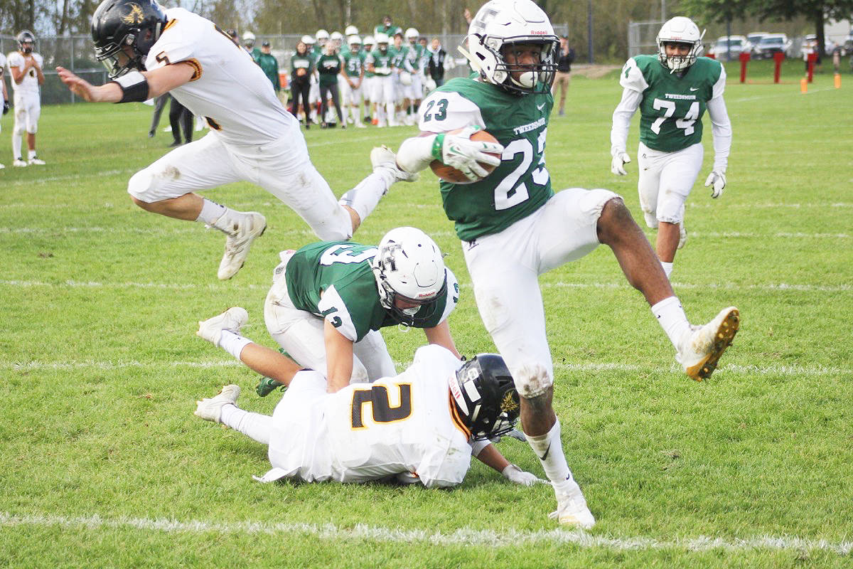 Lord Tweedsmuir’s Tremmel States-Jones jumps a player and the goal line to score a touchdown against the Kelowna Owls in 2019. The face of high school football, along with a majority of other high school sports, could significantly change if a new governance proposal is passed at the B.C. School Sports AGM May 1. (Malin Jordan)