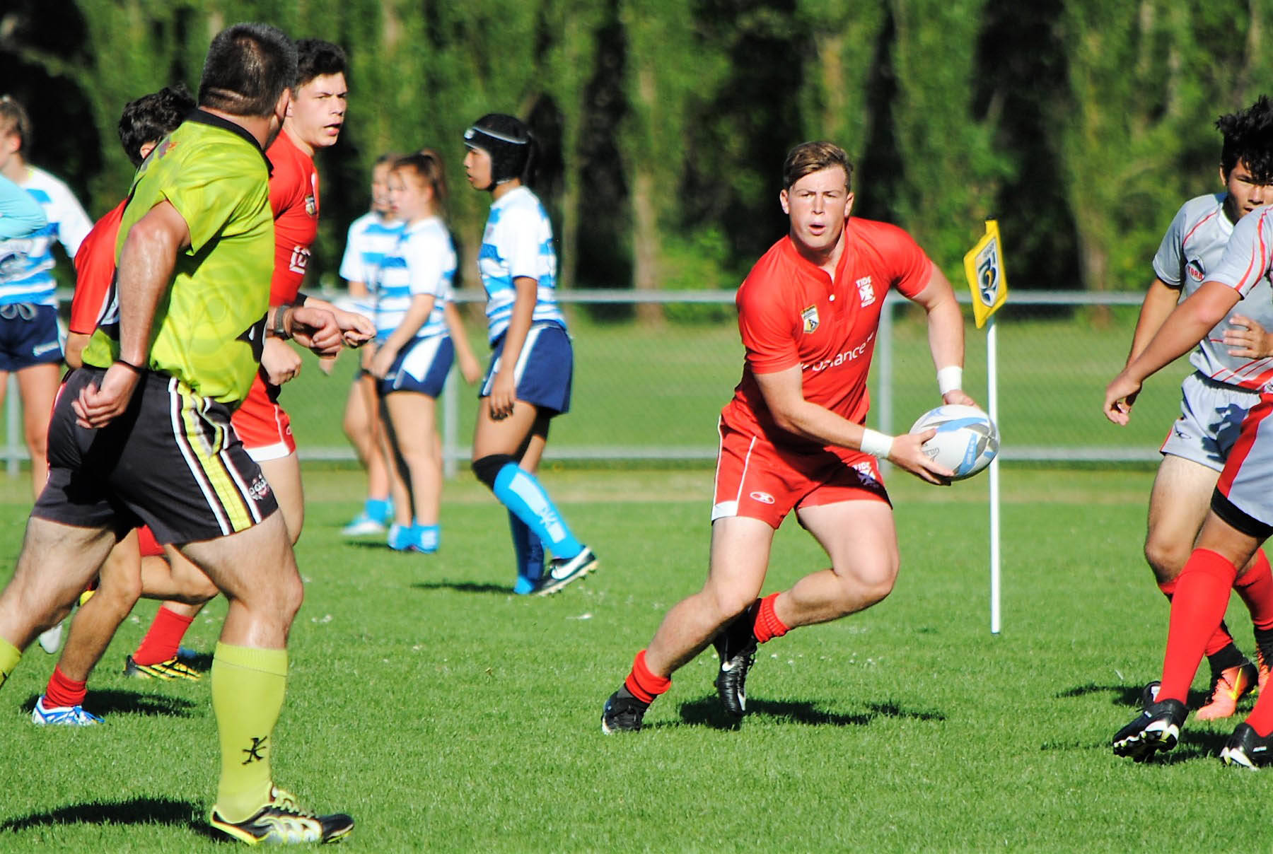 Oak Bay local Lachlan Kratz (red, middle) has signed with pro rugby team NOLO Gold in Louisiana. (Contributed photo)