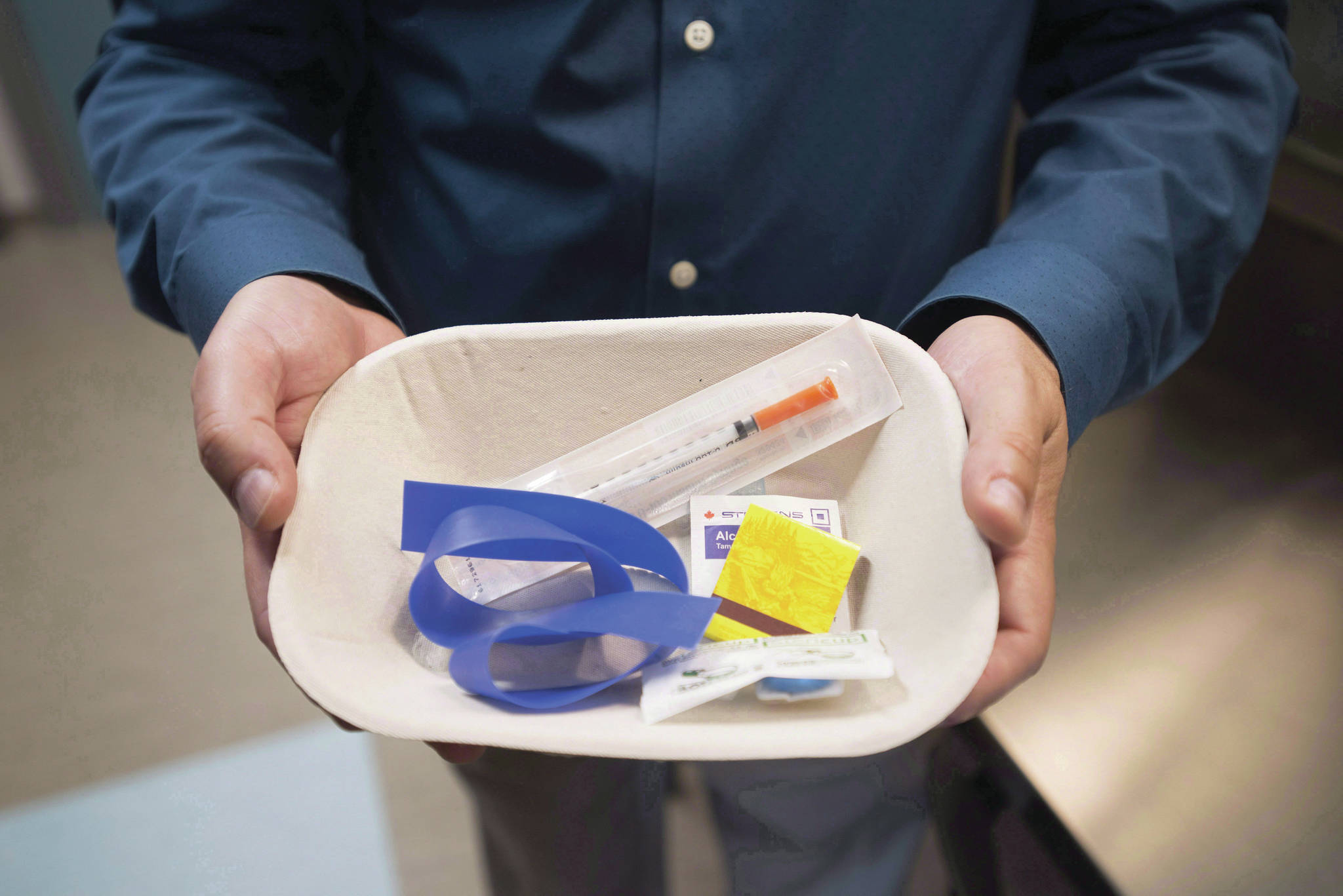 FILE – A injection kit is seen inside the newly opened Fraser Health supervised consumption site is pictured in Surrey, B.C., Tuesday, June 6, 2017. THE CANADIAN PRESS/Jonathan Hayward