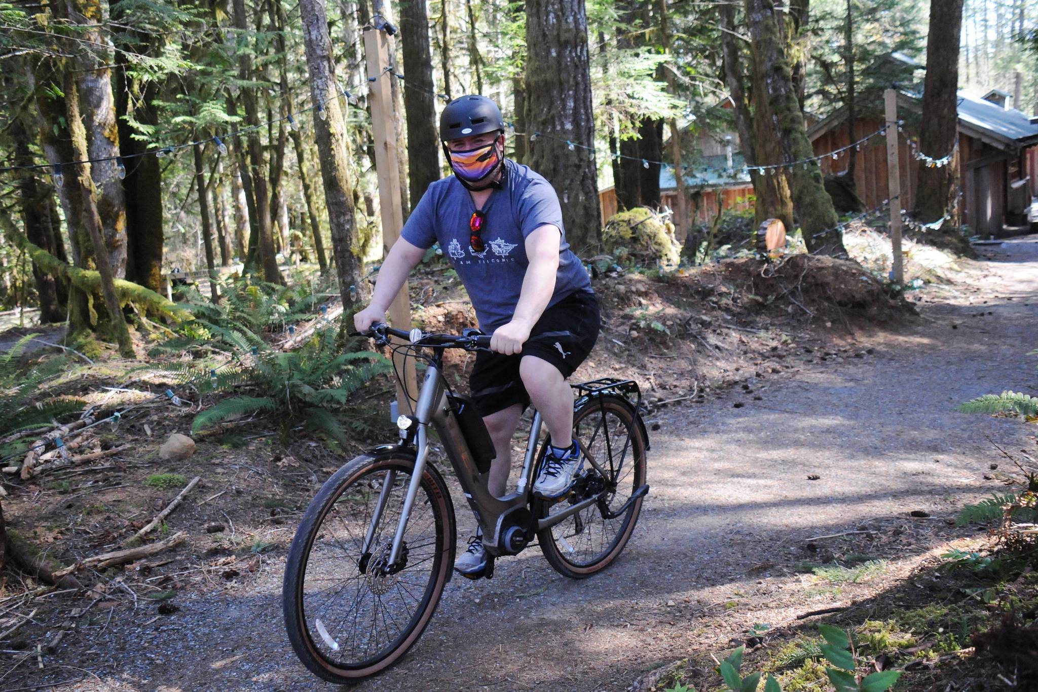 Courtenay-Alberni MP Gord Johns tries out one of the e-bikes that are part of the Alberni Valley Chamber of Commerce’s new Bike SEAT program. The chamber received a New Horizons for Seniors grant for the program. (April 16, 2021) (SUSAN QUINN/ Alberni Valley News)