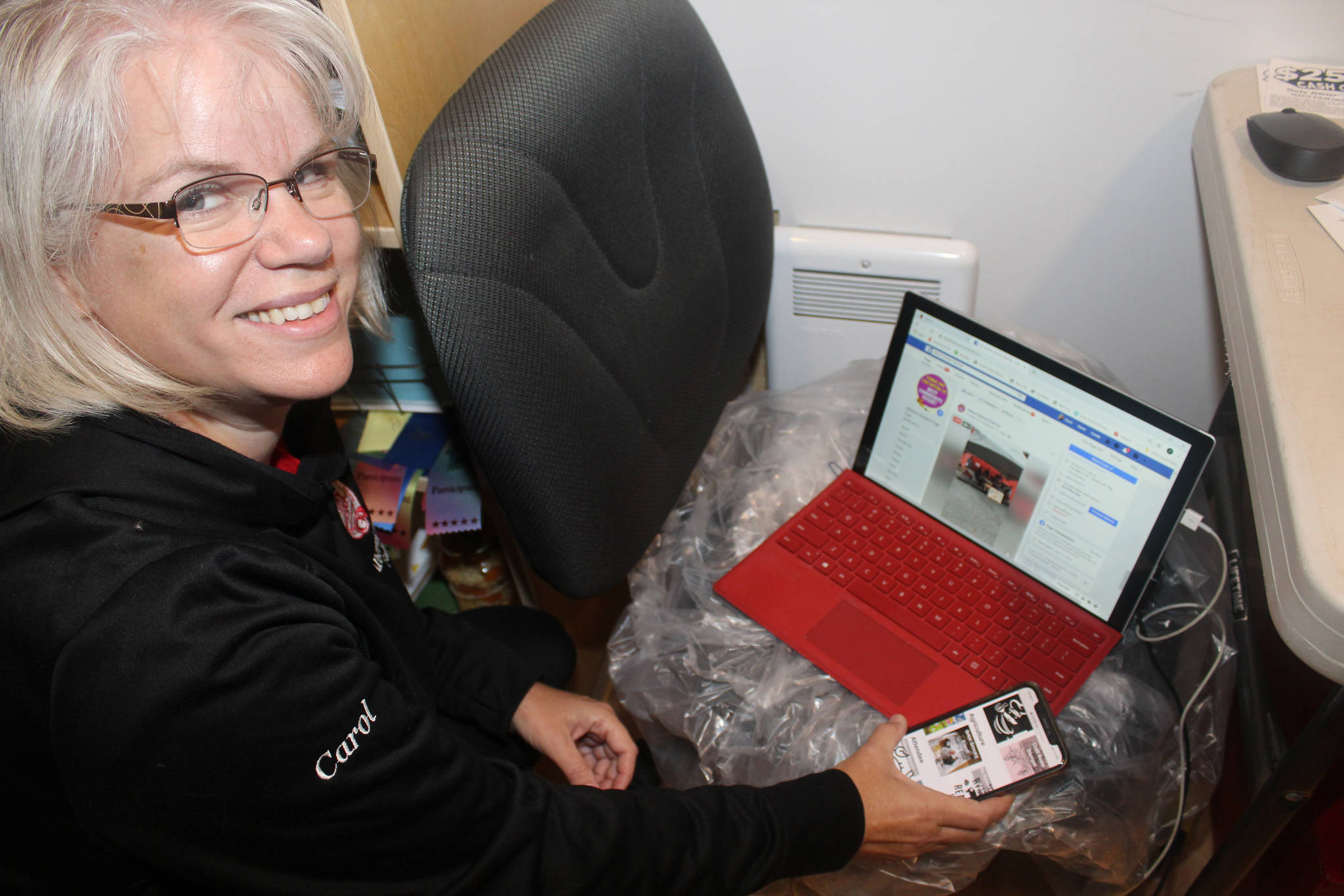 Carol Brown from the Alberni District Fall Fair committee, works on the online feed for the 2020 virtual Fall Fair on Saturday, Sept. 12, 2020. (SONJA DRINKWATER/ Special to the AV News)