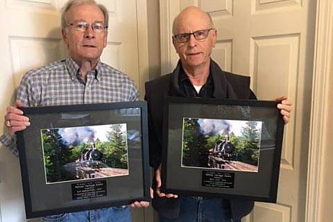 Ken Rutherford, left, and Rick Lord of Port Alberni receive honours from the National Model Railroad Association—Pacific Northwest Region for 40 years of dedication to the preservation and presentation of railroad history. (PHOTO COURTESY PHYLLIS RUTHERFORD)