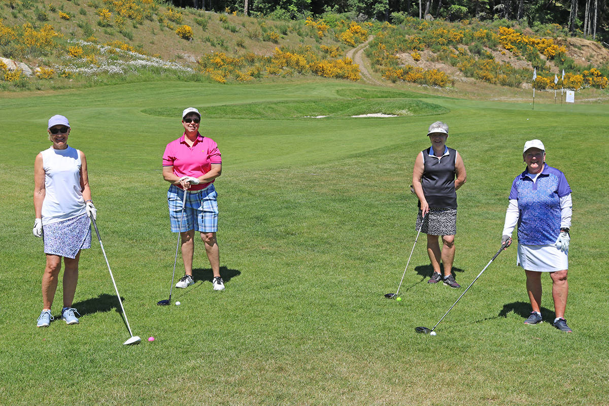 From left: June Hinshaw, Nancy Sermons, Susan DaFoe, and Carol Thompson hit the course at Bear Mountain for International Women’s Golf Day on June 1. (Michelle Cabana/Black Press Media)