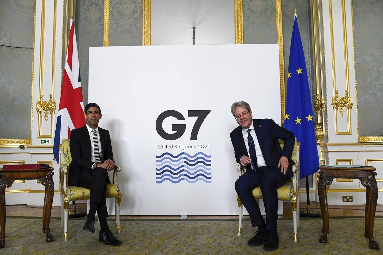 Britain’s Chancellor of the Exchequer Rishi Sunak, left, and EU’s Economy Commissioner Paolo Gentiloni pose for photos as finance ministers from across the G7 nations meet at Lancaster House in London, Saturday, June 5, 2021 ahead of the G7 leaders’ summit. (AP Photo/Alberto Pezzali, Pool)