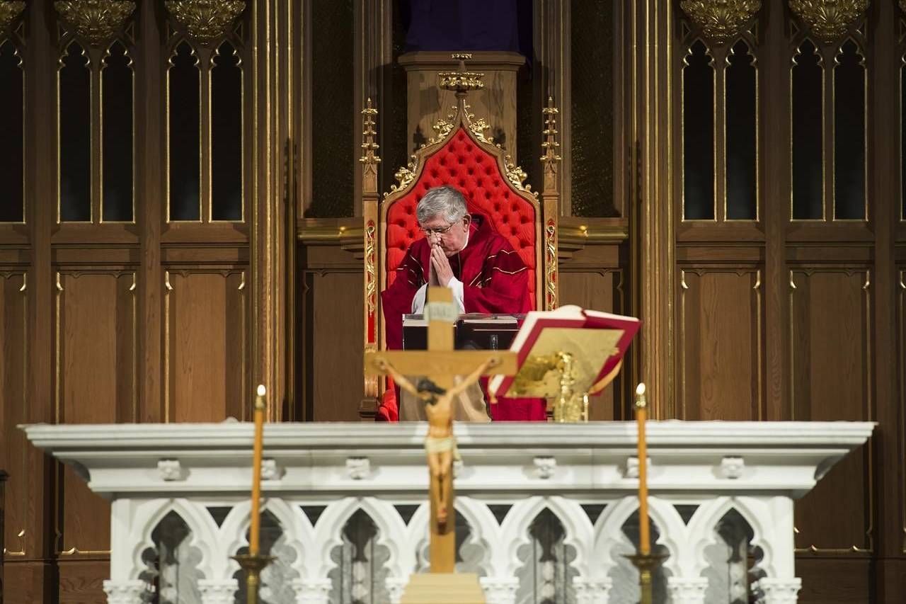 Cardinal Thomas Collins delivers at online Good Friday service in an empty St. Michael’s Cathedral in Toronto on April 10, 2020. THE CANADIAN PRESS/Nathan Denette
