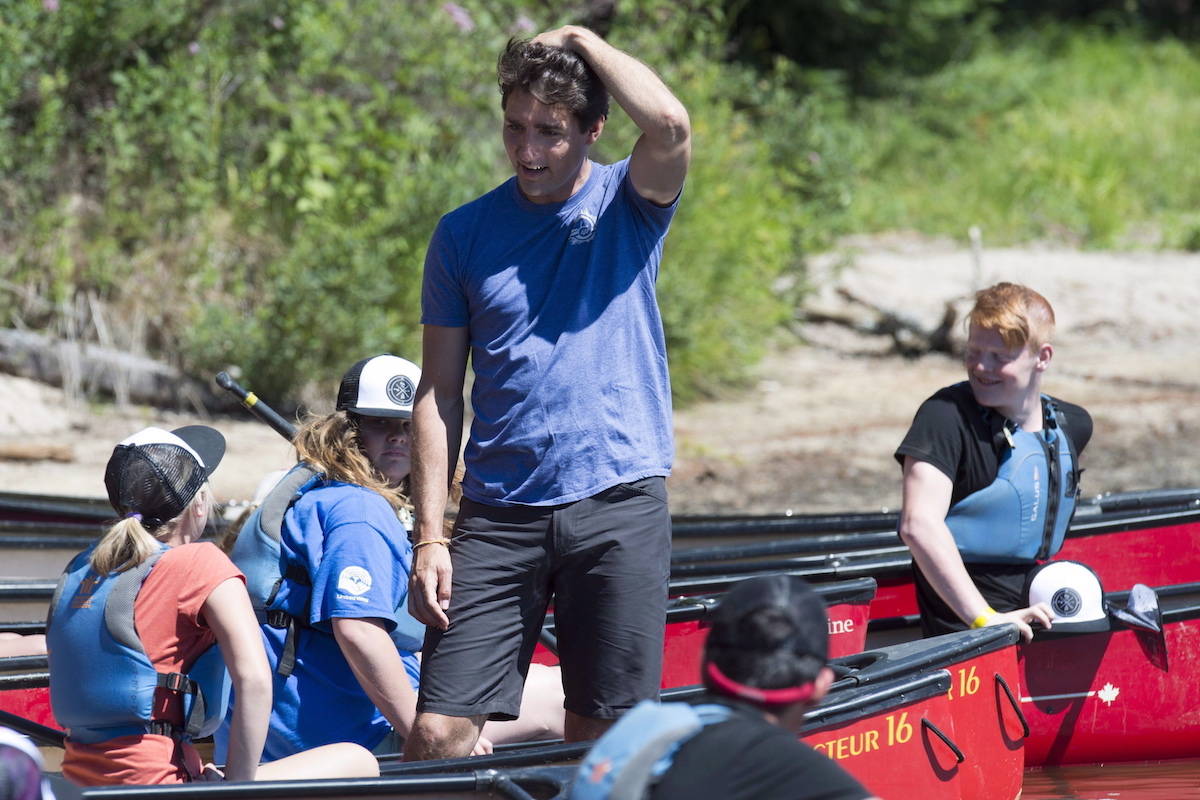 Prime Minister Justin Trudeau greets campers while visiting McDougall, Ont. on Thursday, July 19, 2018. THE CANADIAN PRESS/Frank Gunn