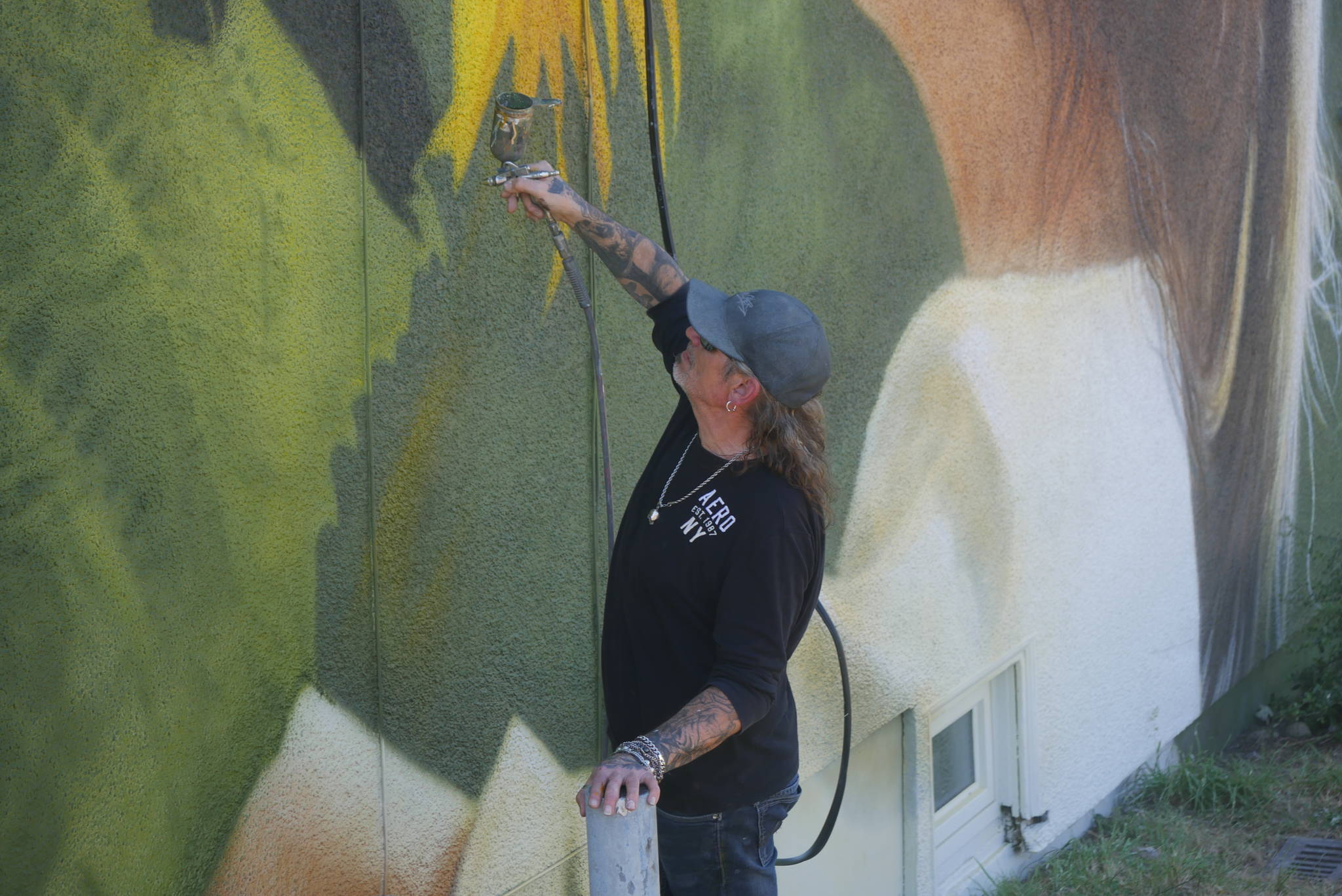 Archer hopes planting sunflowers around the mural will give the art a sense of community and allow viewers to engage with it. (Evert Lindquist photo)