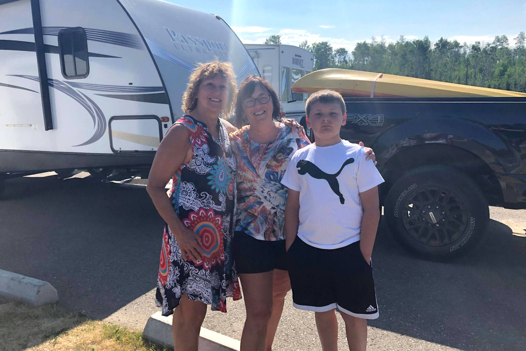 Prince George’s Marlene Rossel and her coworker Lisa Postnikoff and Lisa’s grandson Ryan Jean, were told to leave Green Lake Provincial Park this morning, July 2. (Patrick Davies photo - 100 Mile Free Press).