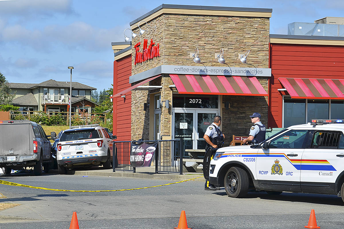 Police attended the Willow Point Tim Hortons in Campbell River for a shooting incident July 8, 2021 in which one man was killed, a police service dog was stabbed to death and his handler injured. Photo by Alistair Taylor/Campbell River Mirror