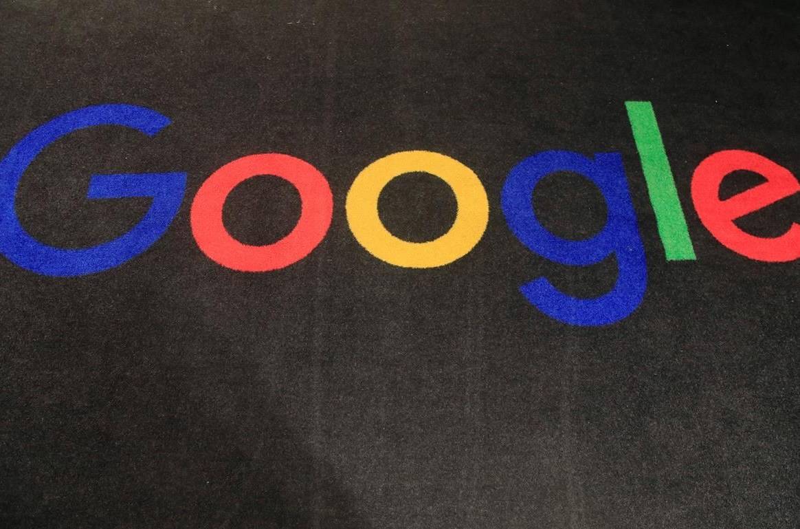 FILE - In this Nov. 18, 2019, file photo, the logo of Google is displayed on a carpet at the entrance hall of Google France in Paris. THE CANADIAN PRESS/AP-Michel Euler