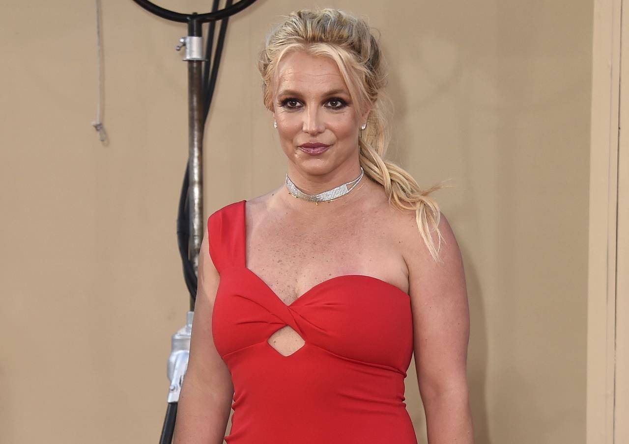 FILE - Britney Spears arrives at the Los Angeles premiere of “Once Upon a Time in Hollywood” on July 22, 2019. When Spears speaks to a judge at her own request on Wednesday, June. 23, 2021, she’ll do it 13 years into a court-enforced conservatorship that has exercised vast control of her life and money by her father. Spears has said the conservatorship saved her from collapse and exploitation. But she has sought more control over how it operates, and says she wants her father out. (Photo by Jordan Strauss/Invision/AP, File)
