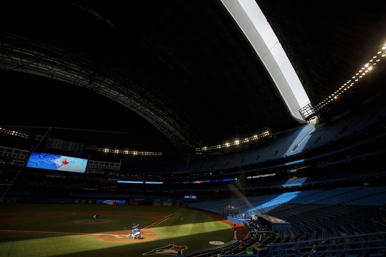 The Toronto Blue Jays participate in a batting practice at Summer Training Camp in Toronto, Sunday, July 19, 2020. Ontario’s sports minister has asked the federal government to allow the Toronto Blue Jays to play in Canada. THE CANADIAN PRESS/Cole Burston