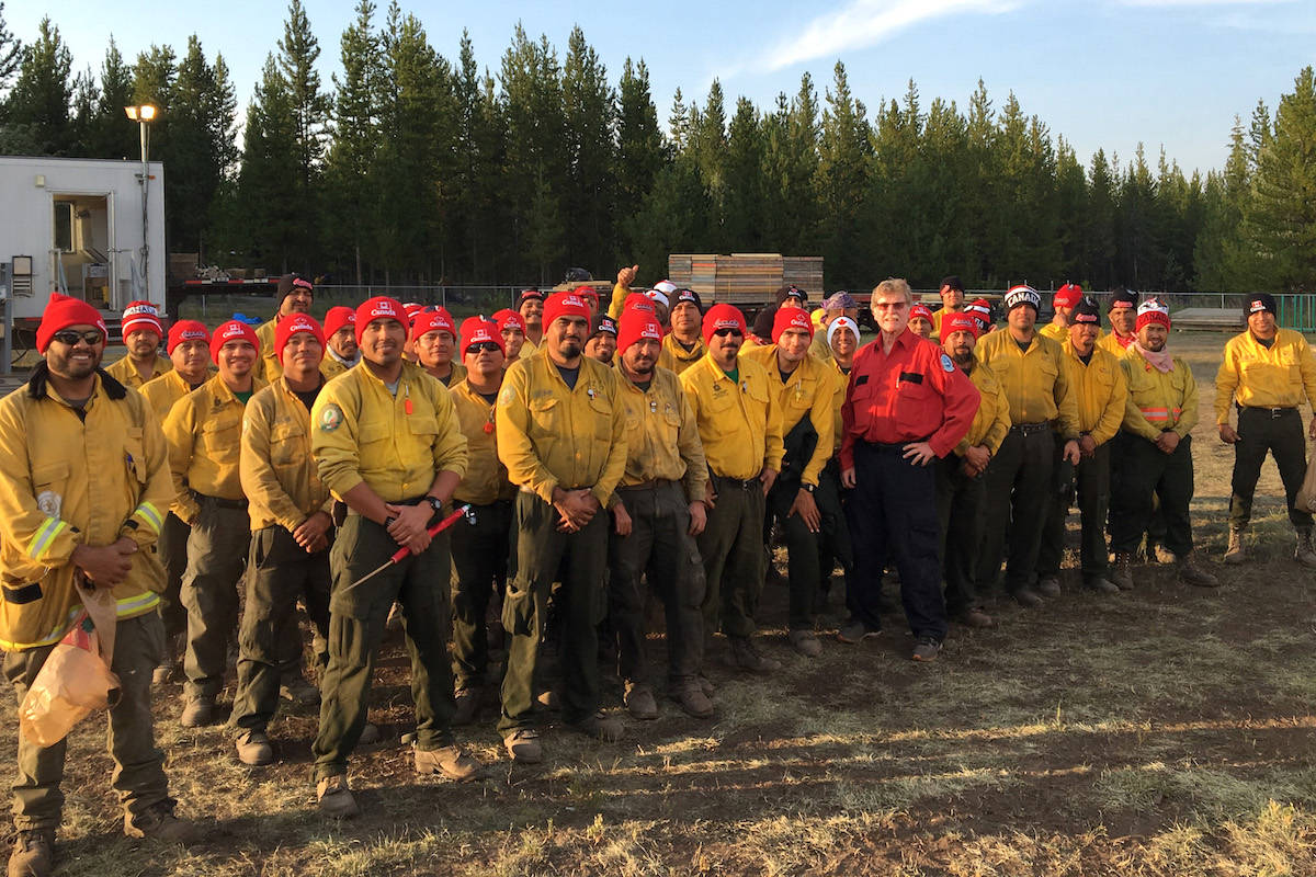 The Mexican firefighters wearing their Canada toques. (BC Wildfire Service)
