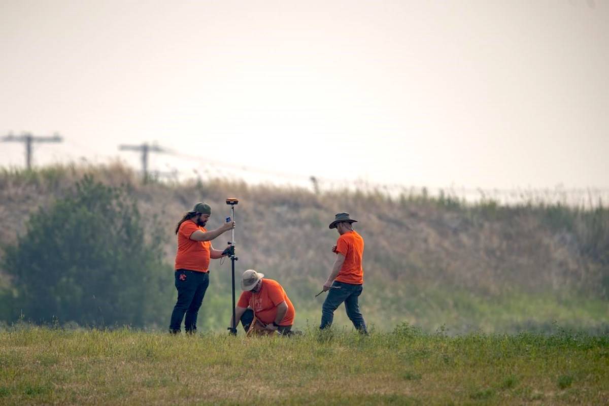 SNC Lavalin engineers use equipment to conduct a search of the grounds at the site of a former Residential School in Delmas, Sask., Saturday, July 17, 2021. THE CANADIAN PRESS/Liam Richards