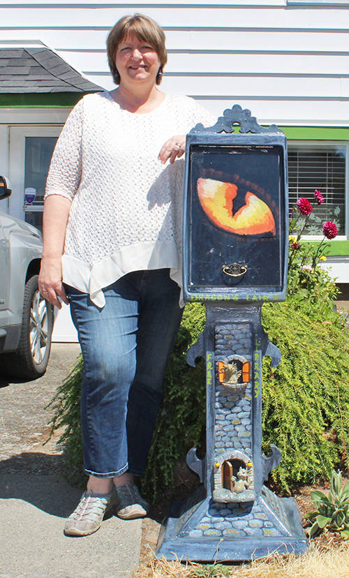 Christine Knox, artist and Saanich resident, is proud to showcase and be a part of Greater Victoria’s 500th Little Free Library unveiling. (Megan Atkins-Baker/News Staff)