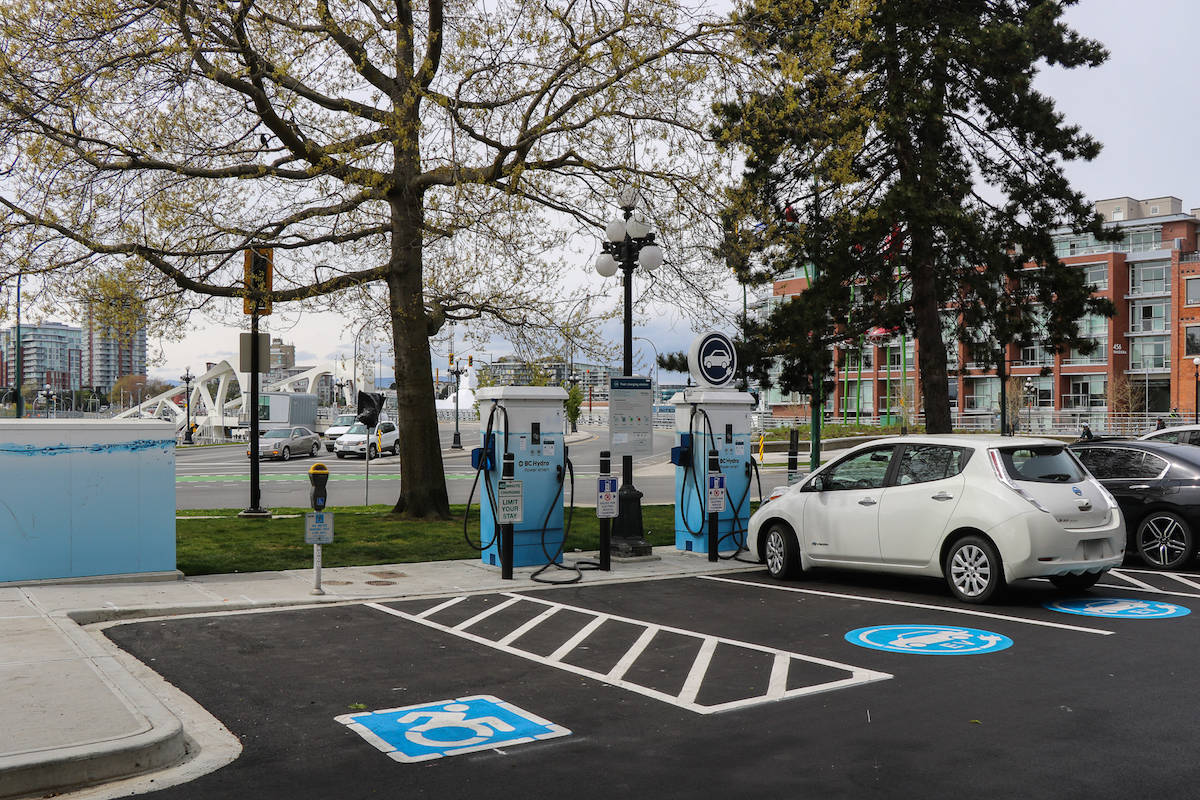 A two-space electric vehicle charging station opened on Store Street this spring. The region needs to ramp up its infrastructure installation progress to meet goals for EV use, according to a new report. (Photo courtesy of the City of Victoria/ Twitter)