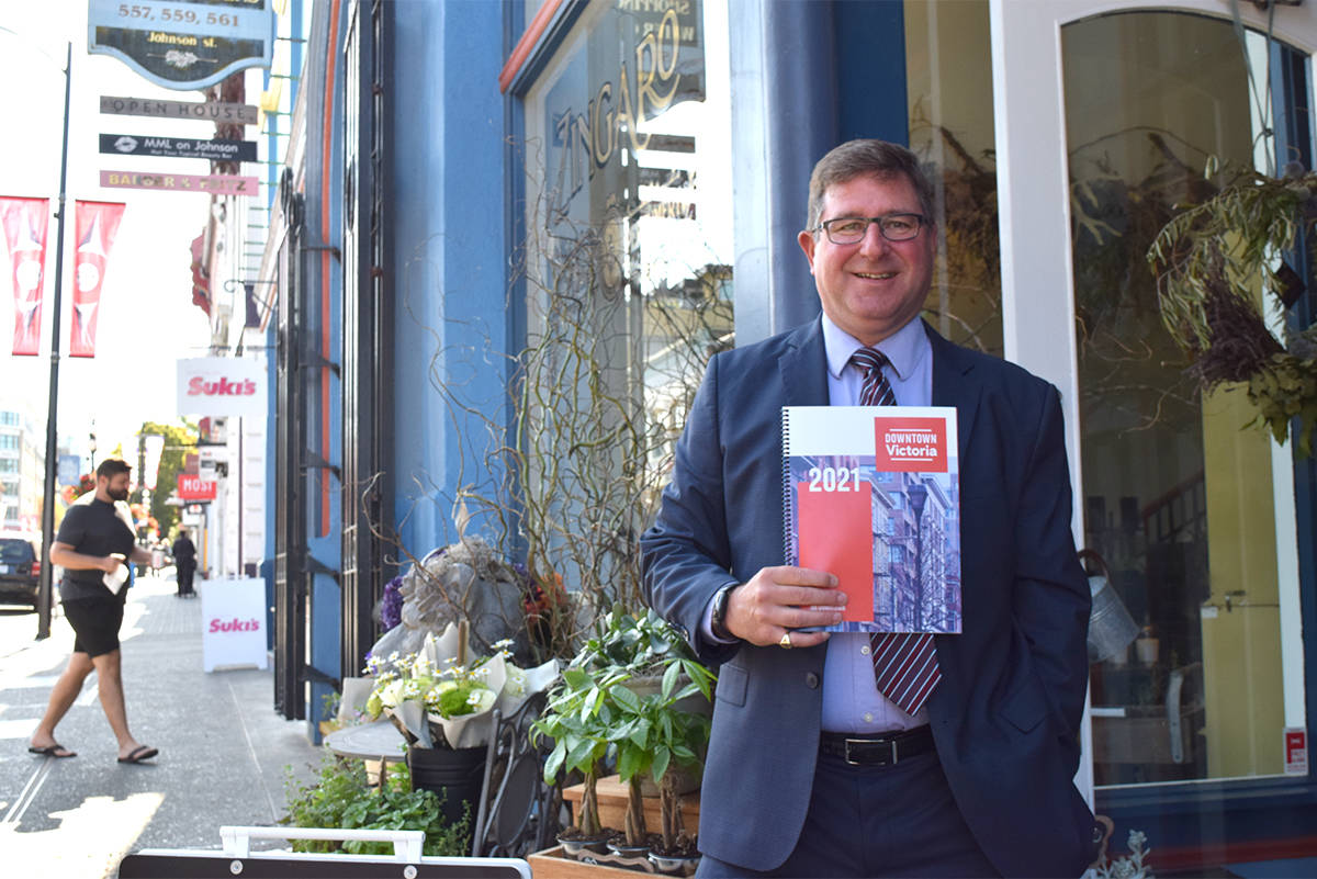 Downtown Victoria Business Association executive director Jeff Bray stands outside Zingaro Floral Perfumery at 561 Johnson St., among the new businesses that opened downtown this year. (Kiernan Green/News Staff)