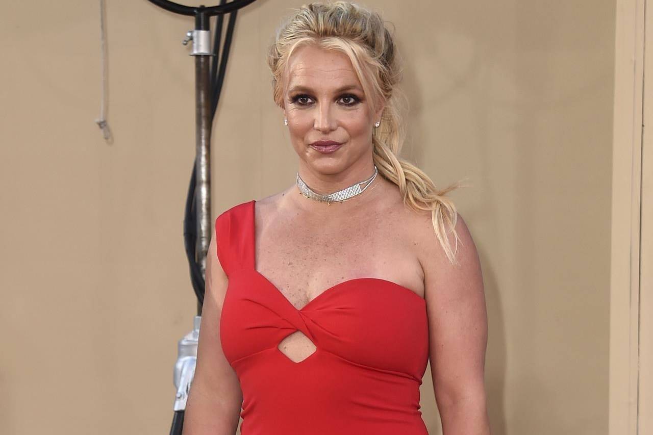 FILE - Britney Spears arrives at the Los Angeles premiere of “Once Upon a Time in Hollywood” on July 22, 2019. When Spears speaks to a judge at her own request on Wednesday, June. 23, 2021, she’ll do it 13 years into a court-enforced conservatorship that has exercised vast control of her life and money by her father. Spears has said the conservatorship saved her from collapse and exploitation. But she has sought more control over how it operates, and says she wants her father out. (Photo by Jordan Strauss/Invision/AP, File)