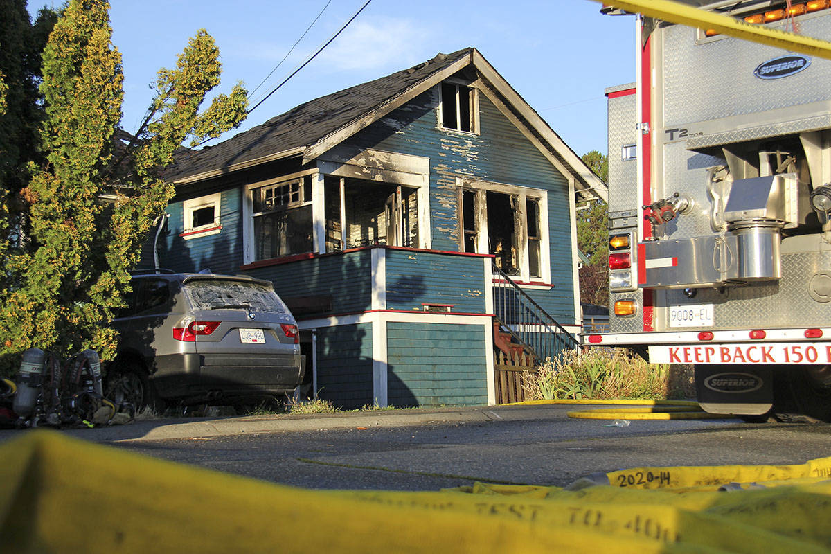 A Saanich home in the 100-block of Battleford Avenue suffered severe damage from an early Aug. 11 fire. The blaze is considered suspicious. (Jane Skrypnek/News Staff)