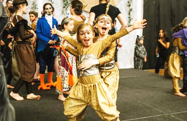 Students Sophia Petronas, left, and Beyla Medos strike a pose in rehearsal as lionesses in The Lion King from 2019. Amber Academy launches its 2021-22 season on Sept. 13. (Contributed - Amber Academy)