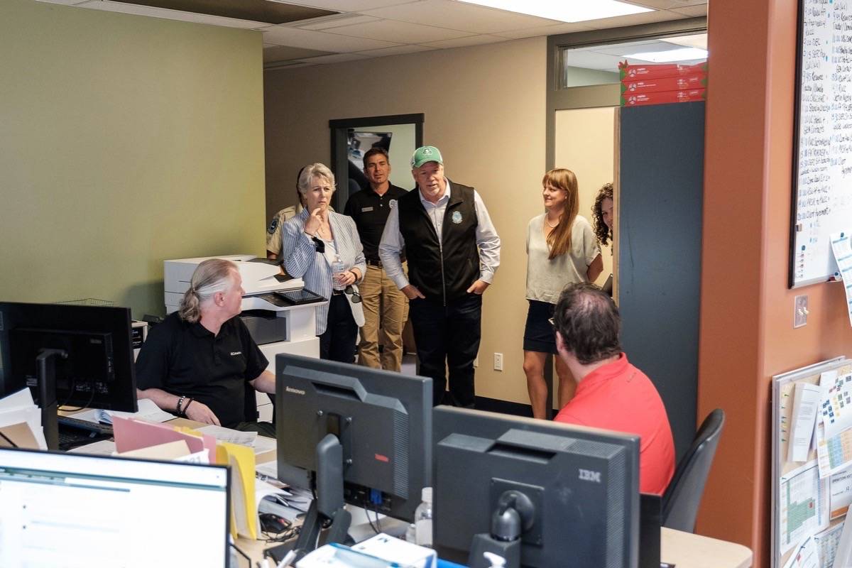 B.C. Premier John Horgan and Forests Minister Katrine Conroy visit B.C. Wildfire Service southeast fire centre in Castlegar, July 21, 2021. This week they toured the North Okanagan and stopped at Logan Lake fire department Friday. (B.C. government photo)