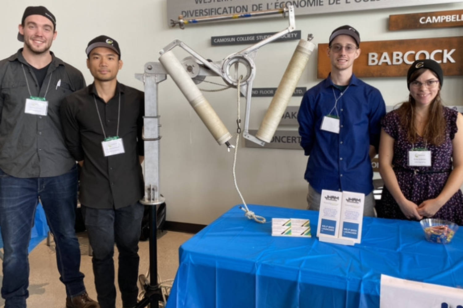 Marshel Glidden, Huu Duong Nguyen, Justin Tomlinson and Anika Andersen with the mechanical engineering program at Camosun College show off their Kelp Seed Launcher V2.0 that they designed for Sidney’s Cascadia Seaweed. (Cascadia Seaweed/Submitted)