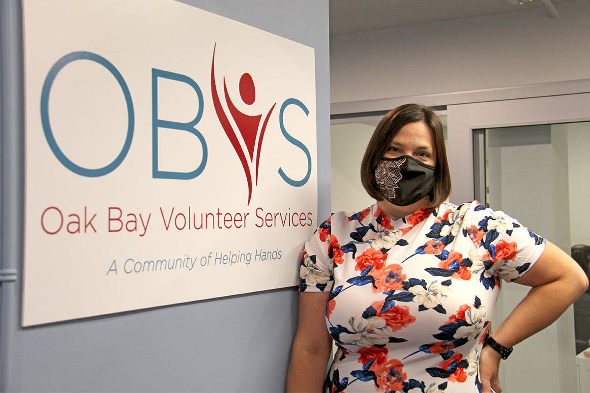 Renee Lorme-Gulbrandsen, executive director for Oak Bay Volunteer Services Society, is excited about the new office at 1442 Monterey Ave. (Christine van Reeuwyk/News Staff)