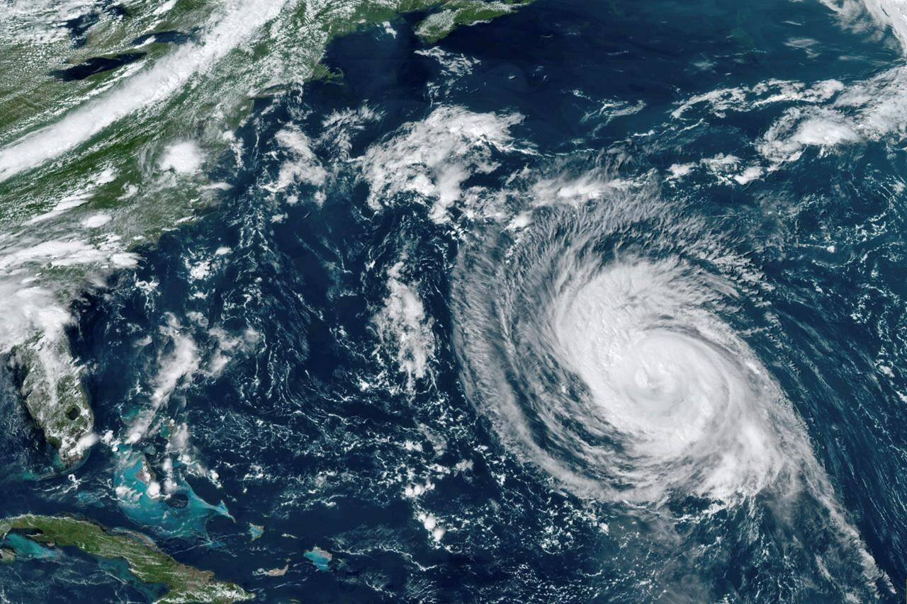 This GOES-16 East GeoColor satellite image taken Wednesday, Sept. 8, 2021, at 2:20 p.m. EDT, and provided by NOAA, shows hurricane Larry in the Atlantic Ocean. The National Weather Service is warning that swells from Hurricane Larry will create dangerous rip current conditions. THE CANADIAN PRESS/AP-NOAA via AP